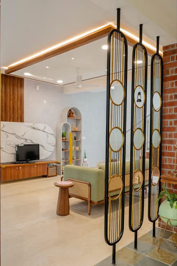 Asambhrama: Art-Deco Partition — 📍 Asambhrama Interior Design · Brass Divider & Brick